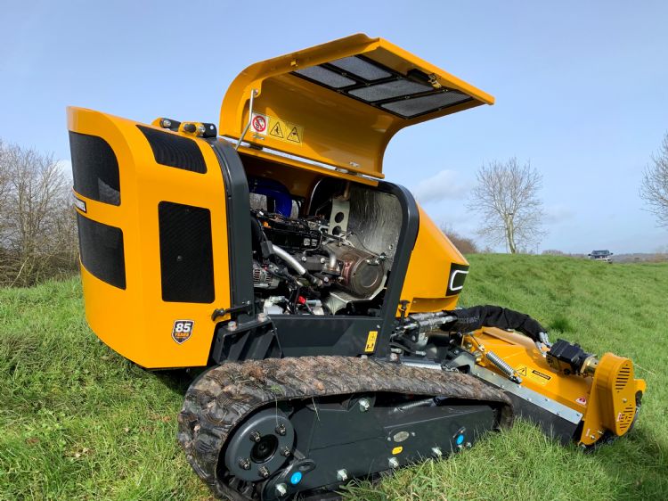 Er zijn drie soorten rupsbanden. Hier gemonteerd: het superrubber-tractorprofiel Er zijn drie soorten rupsbanden. Hier gemonteerd: het superrubber-tractorprofiel